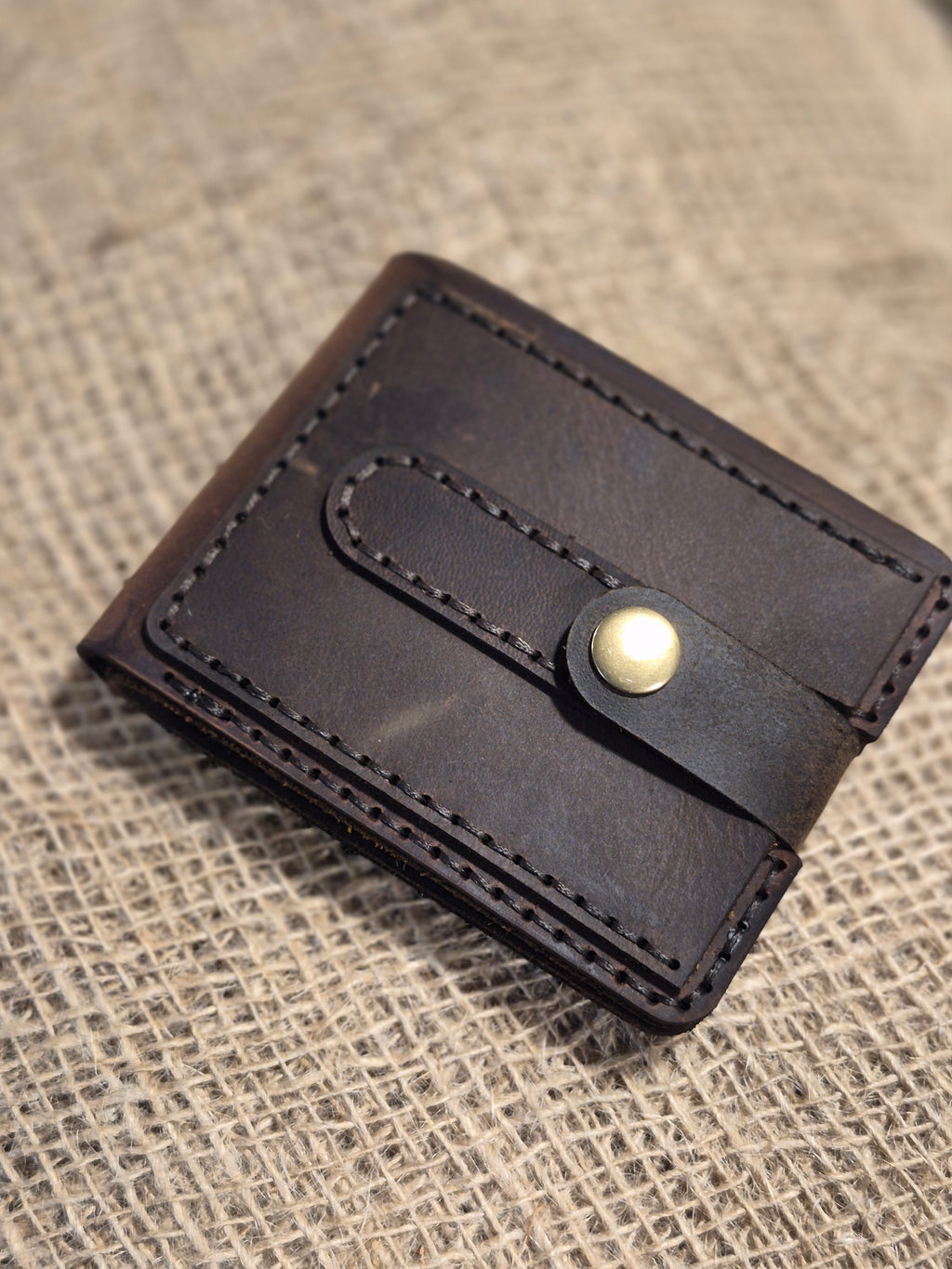Portefeuille artisanal en cuir cousu main